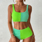 Women’s high waist bikini swimwear by Bella Mia, solid color sexy split swimsuit with a flattering fit, perfect for beach or pool.