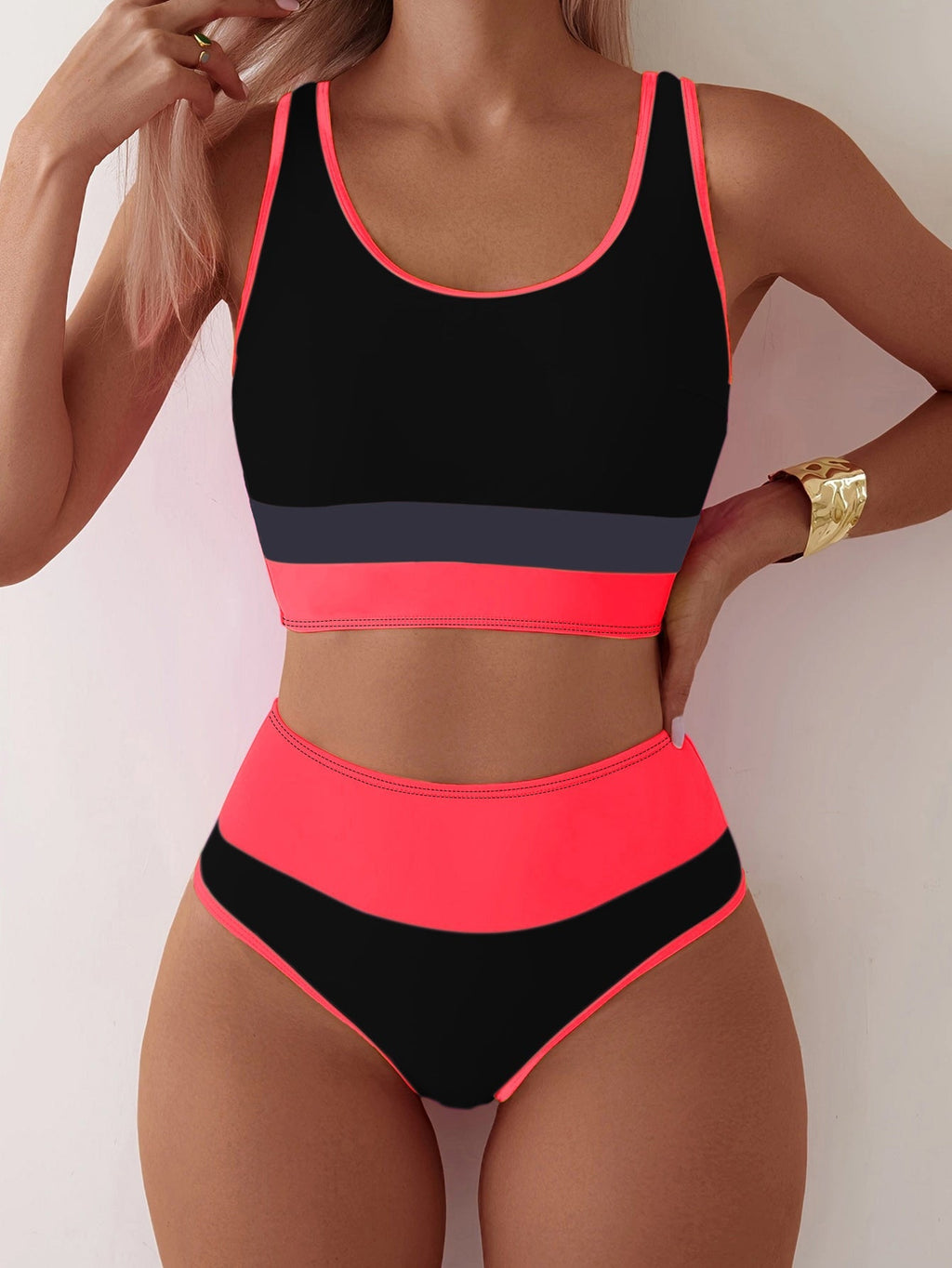 Backless women’s two-piece sports swimsuit in contrast color by Bella Mia, featuring a stylish and supportive design.