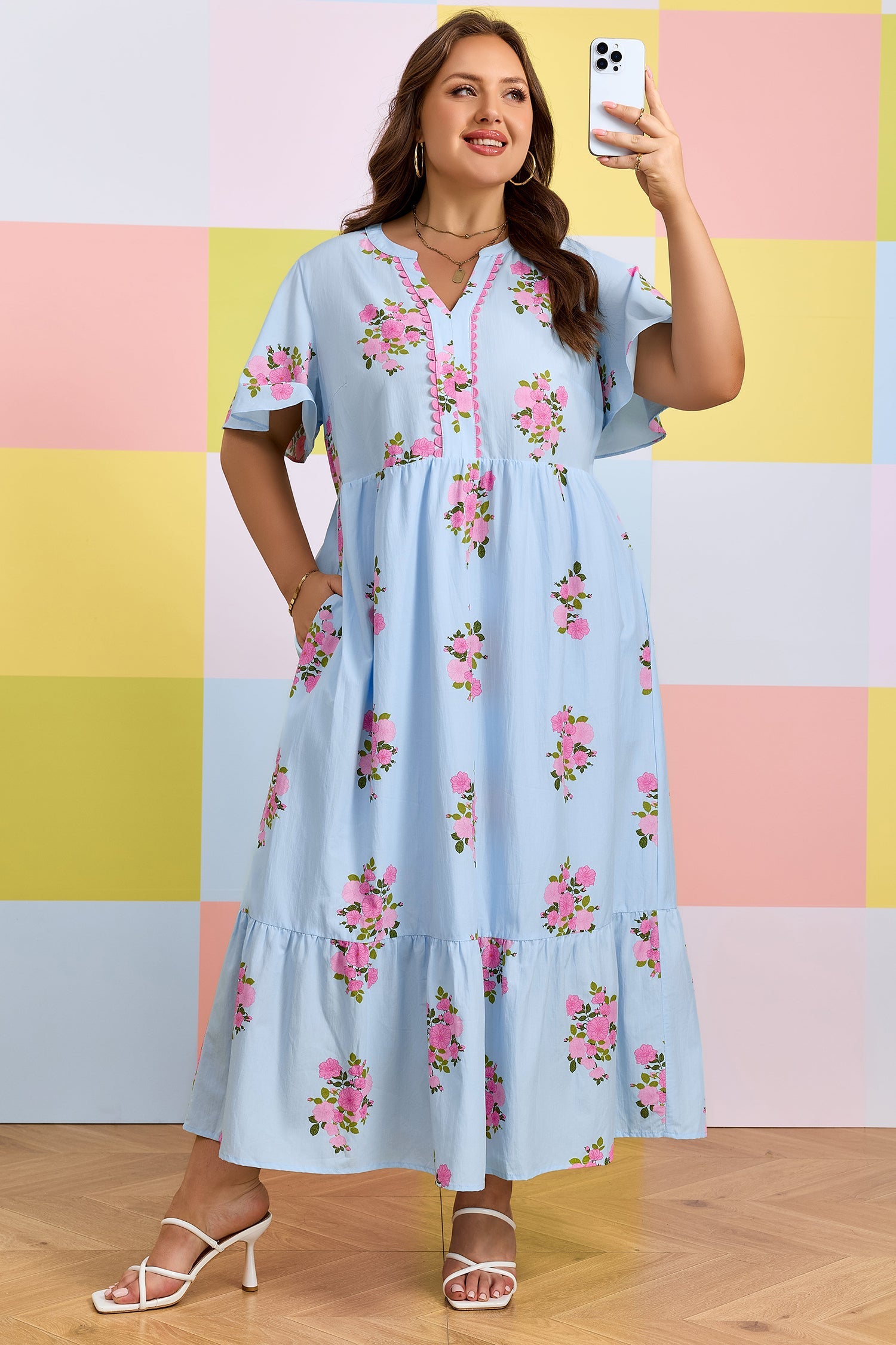 Plus size Lucy Print Scalloped Trim maxi dress by Threaded Pear featuring a vibrant floral pattern and scalloped hem detail.