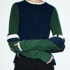 Women wearing Bella Mia casual loose contrast color knitwear, showcasing a stylish, comfortable knit top with color blocking details.
