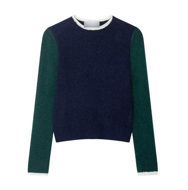 Women wearing loose contrast color knitwear by Bella Mia, showcasing casual, comfortable style with mixed knit patterns.