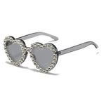 Peach heart-shaped Rhinestone sunglasses in Y2K style, featuring embellished frames and trendy eyewear design.