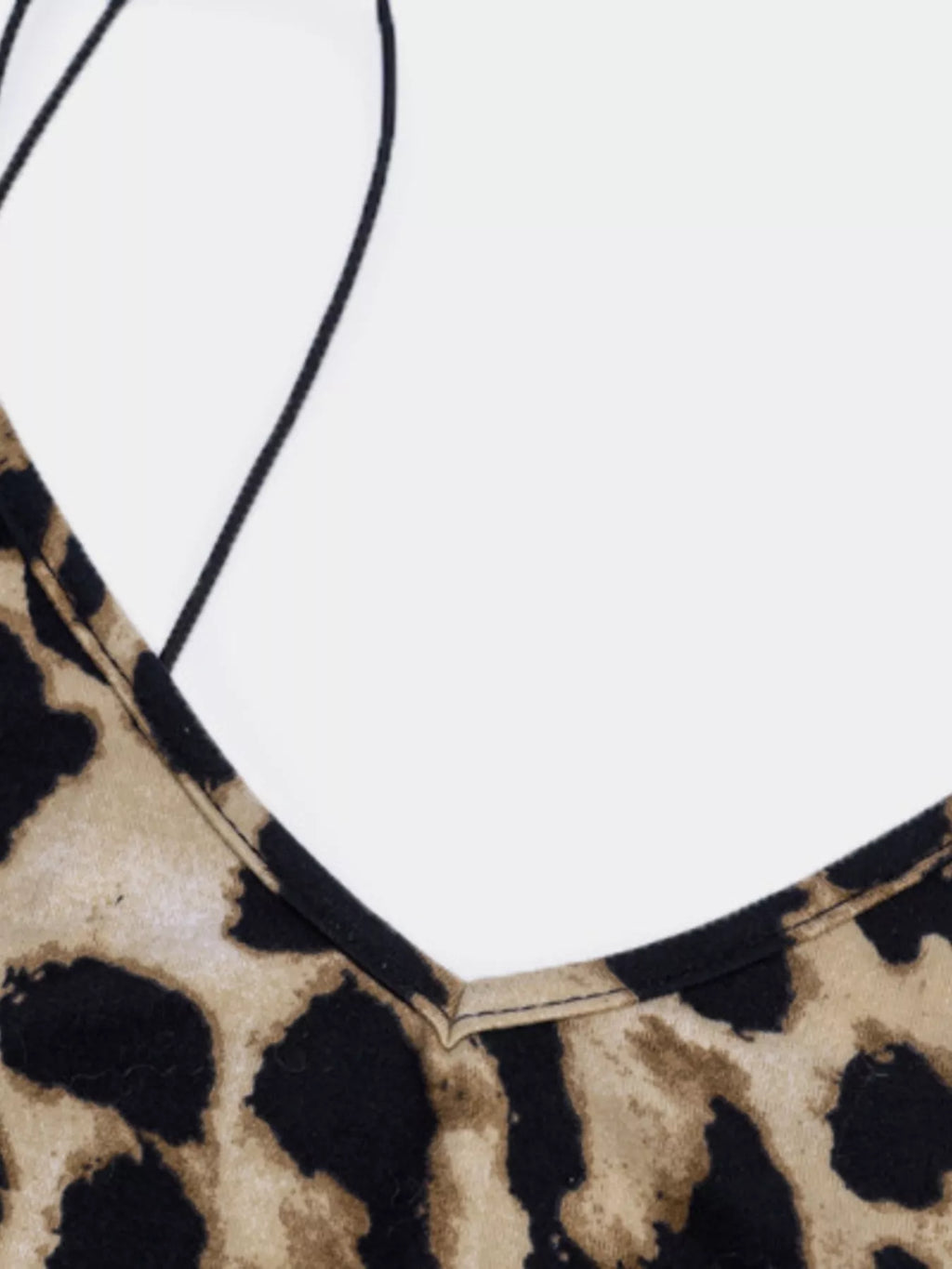 Leopard print spaghetti strap midi dress from Shopimist, featuring fitted silhouette and stylish design, shown on a model.