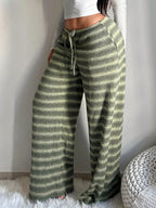 Women's casual straight-leg trousers with contrasting color striped design, slimming fit, and comfortable loose fit from Wanita Store.