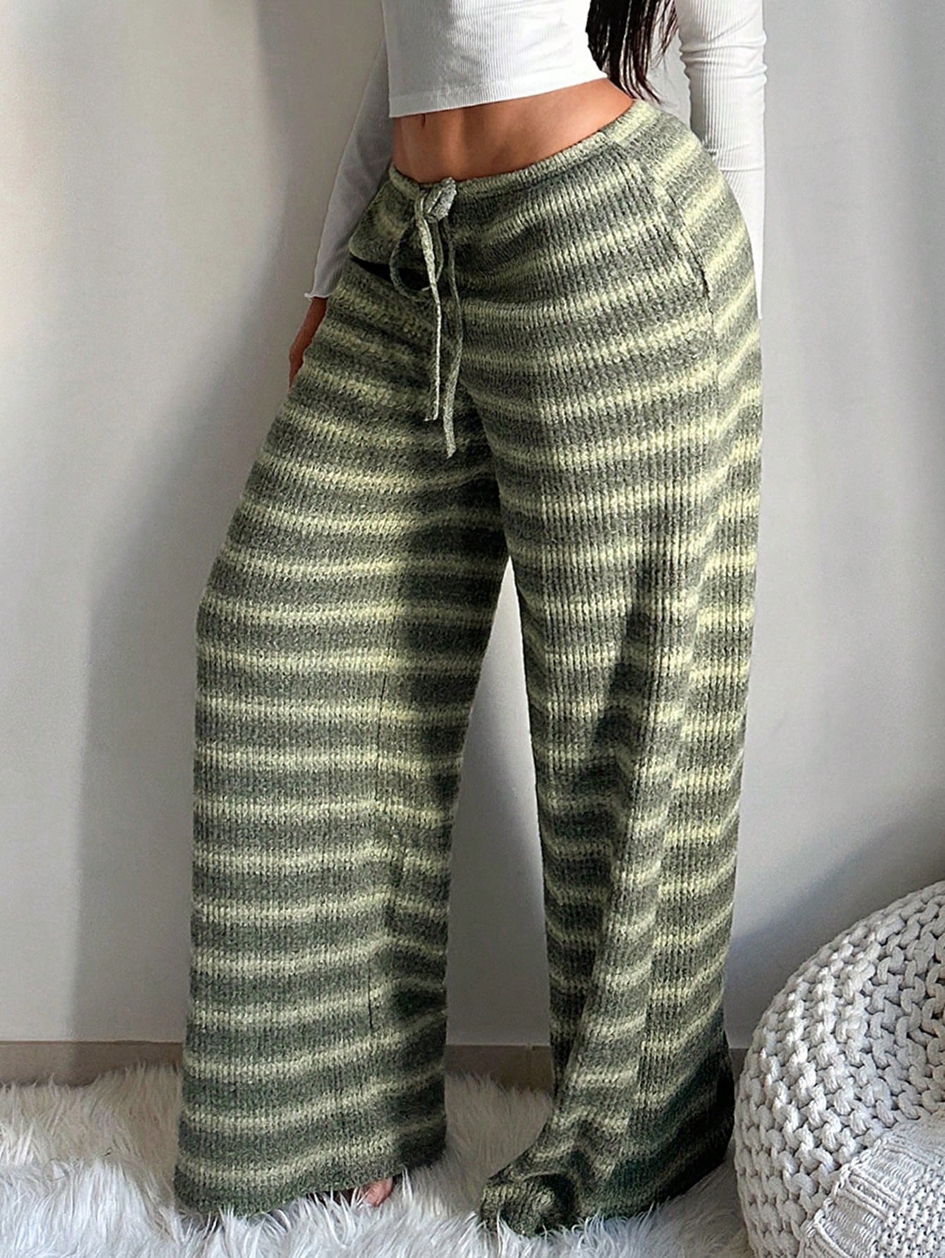 Casual women's striped trousers by Plush Fashion Hub featuring slim fit, straight-leg design and contrast color stripes.