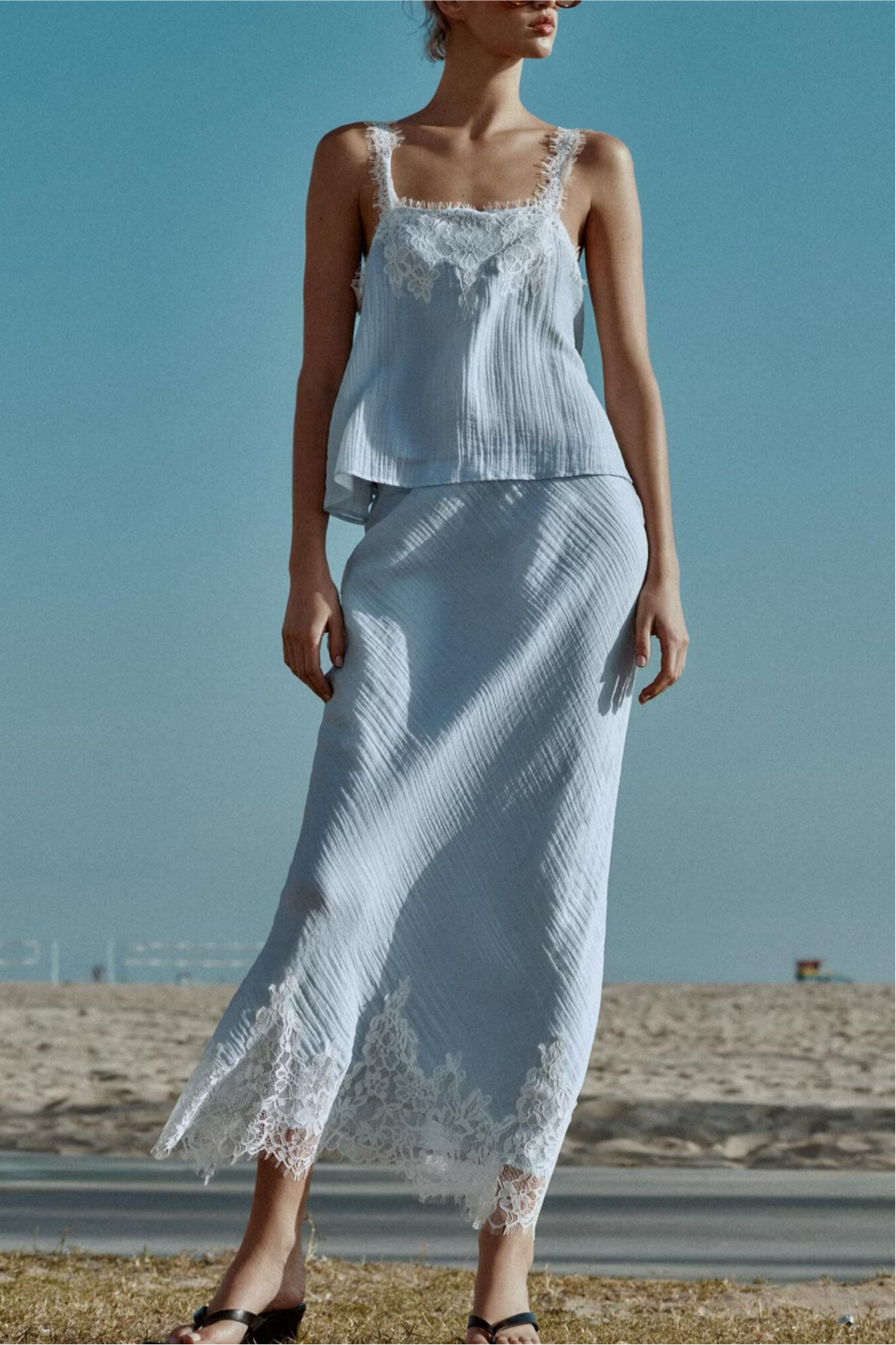 Women’s lace short top and midi skirt set by Plush Fashion Hub, featuring stylish Western-inspired lace clothing ensemble.