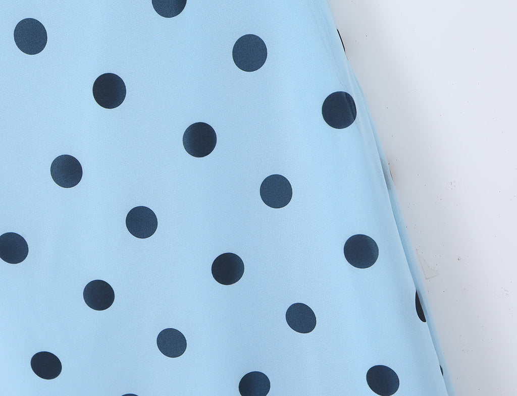 Pink polka dot vintage maxi dress for women featuring a backless lace-up design and a tight waist, by Plush Fashion Shop.