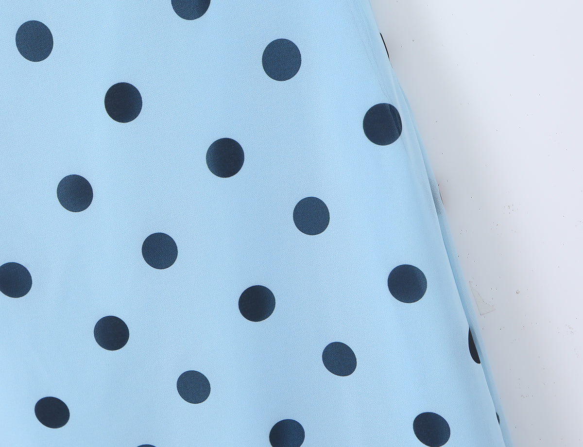 Pink polka dot vintage maxi dress for women featuring a backless lace-up design and a tight waist, by Plush Fashion Shop.
