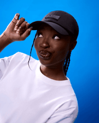 Black waterproof satin-lined dad hat with curved brim and adjustable strap, made by Plush Fashion Hub.