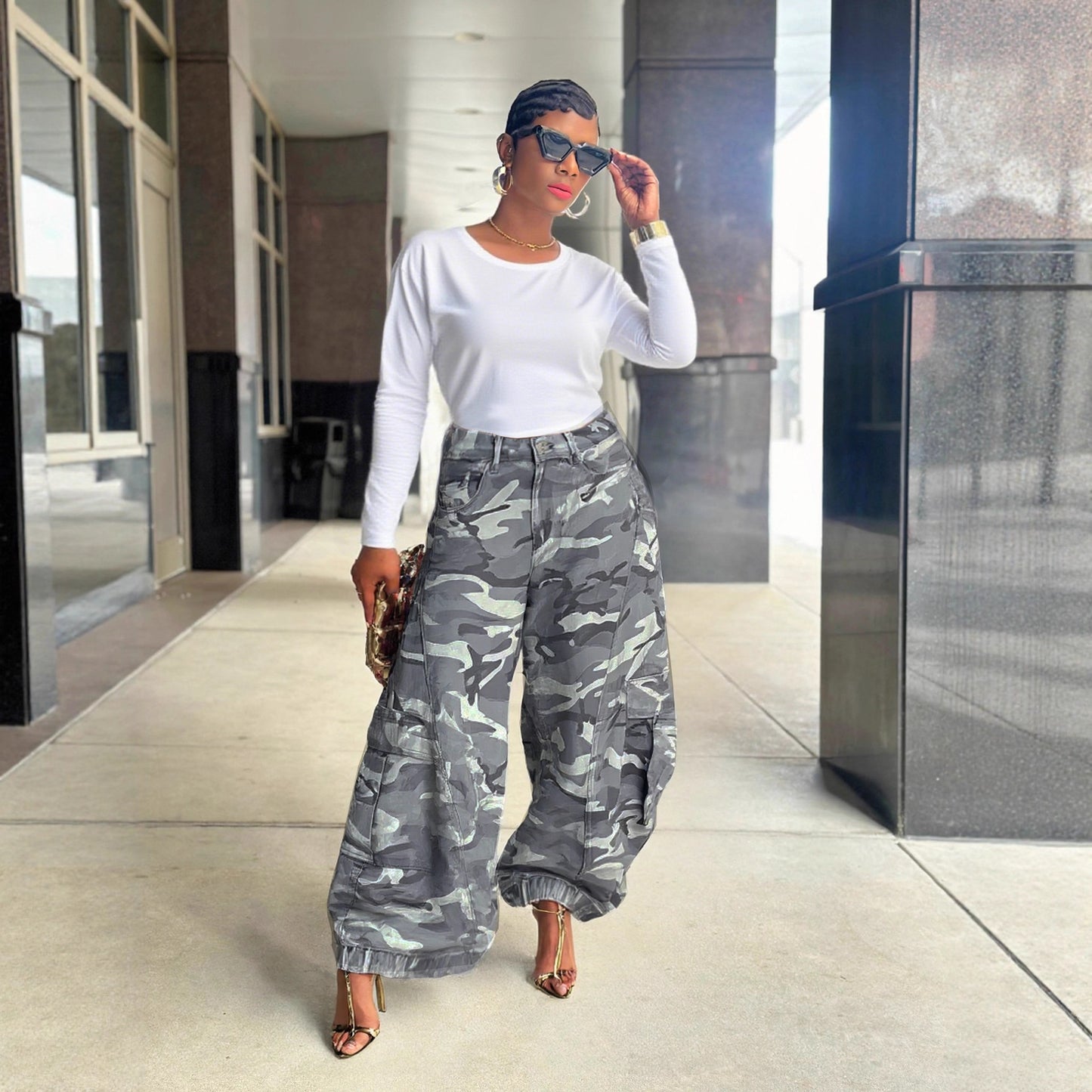 Women’s camouflage wide-leg cargo denim jeans by Plush Fashion Hub, featuring a relaxed fit and stylish camo print.