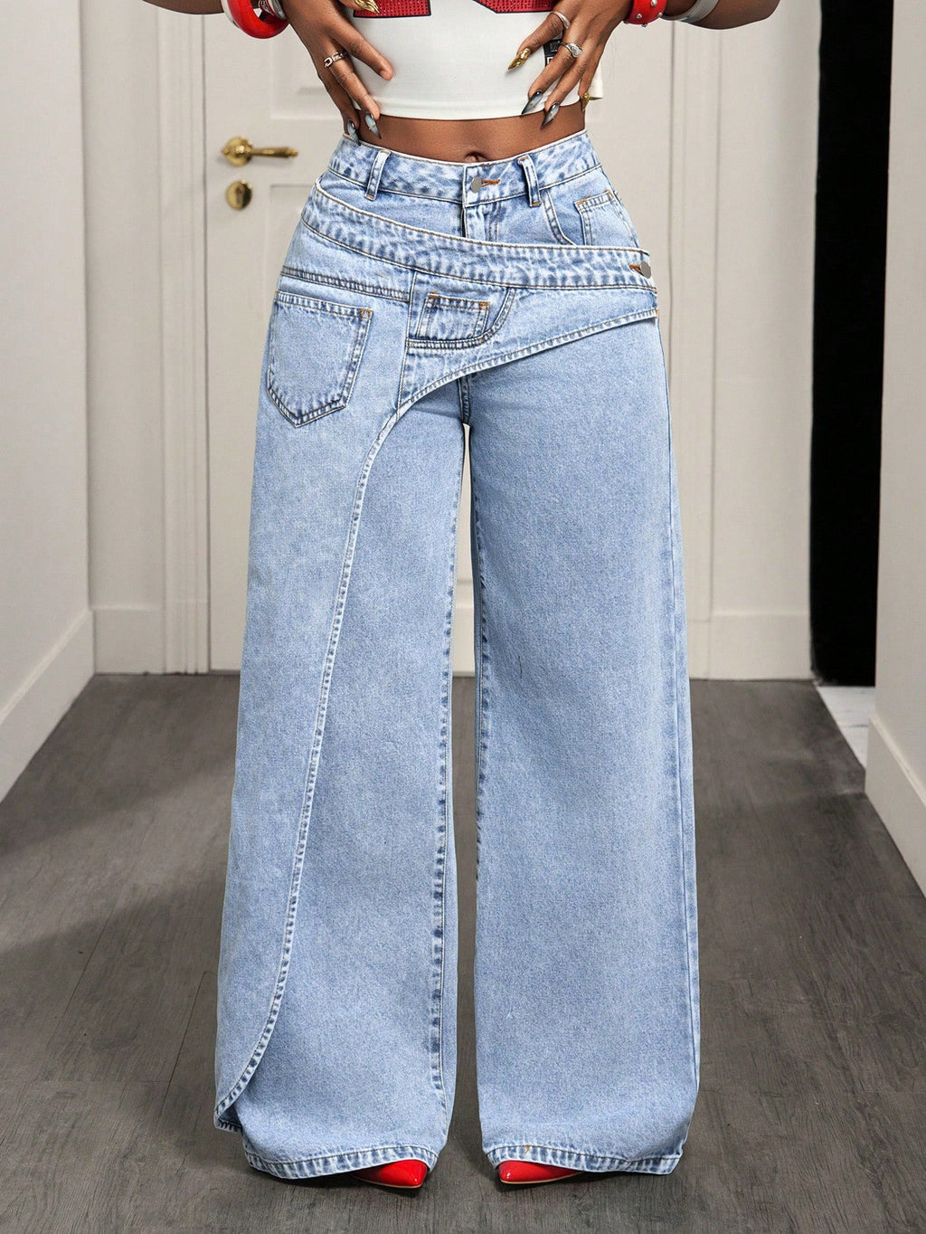 Light blue casual women jeans from Wanita Store, featuring a classic fit with front pockets and belt loops.