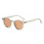 Retro round UV400 sunglasses with tinted European-style frames, stylish eyewear from Plush Fashion Hub.