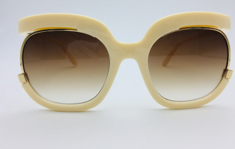 Cat Eye Half-Frame UV400 sunglasses for women by FitiqueFit, showcasing stylish eyewear with tinted lenses and elegant design.