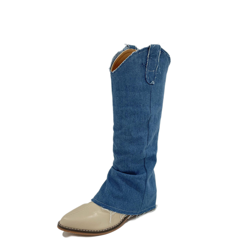 Blue denim and cream leather western boot with pointed toe, pull tabs, and frayed shaft hem.