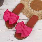Shopimist bowknot embellished flat sandals with decorative bows and comfortable flat sole, perfect for casual or summer wear.
