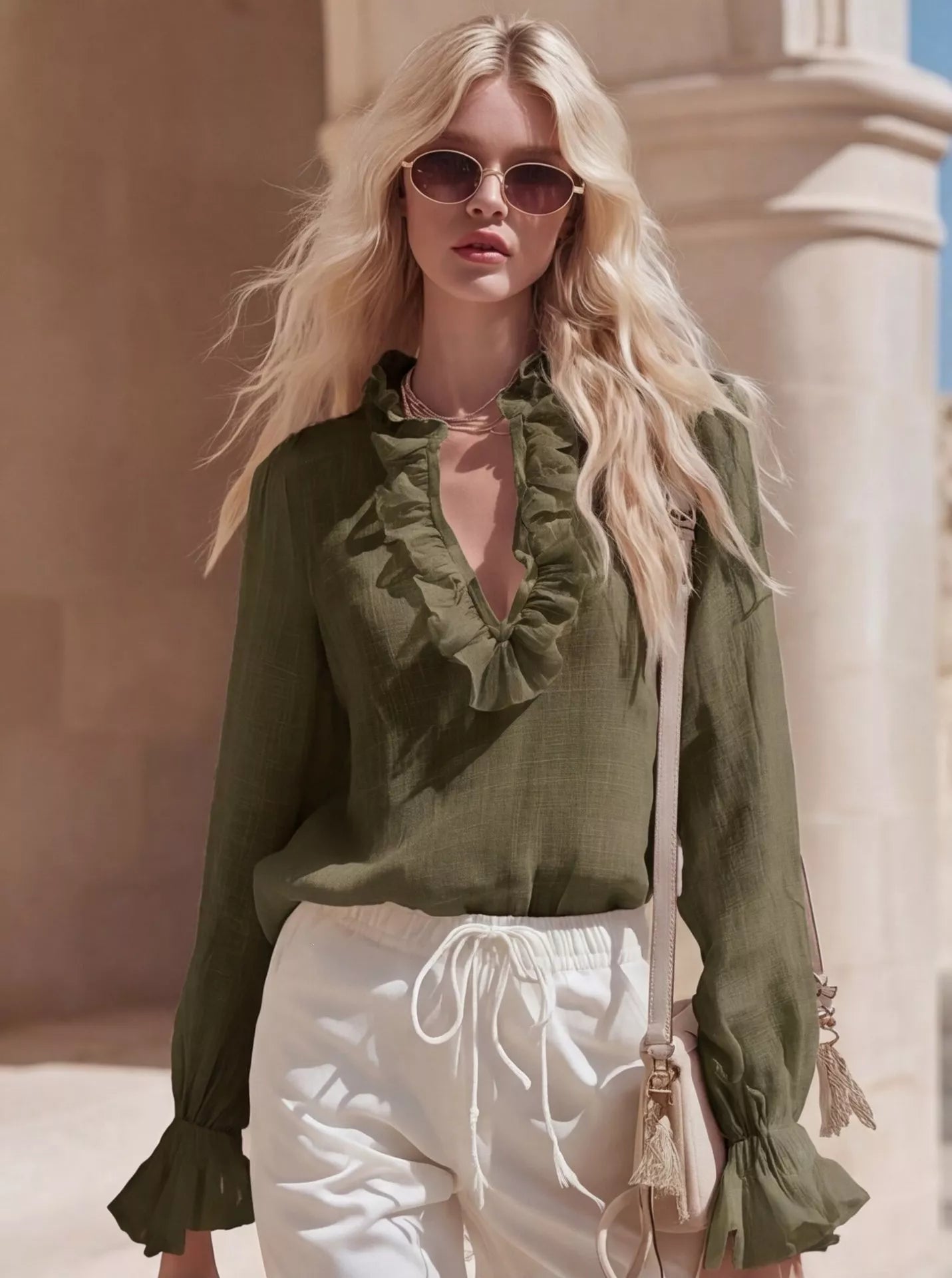 Shopimist ruffled V-neck long sleeve blouse with feminine ruffle details and V-neck design, shown in a stylish, flowy fabric.