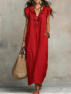 Women's spring and summer ruffle dress with pockets by Plush Fashion Hub, featuring an elegant design and floral pattern.