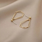 18K gold-plated alloy geometric wire drop earrings with modern minimalist design and sleek, stylish appearance.