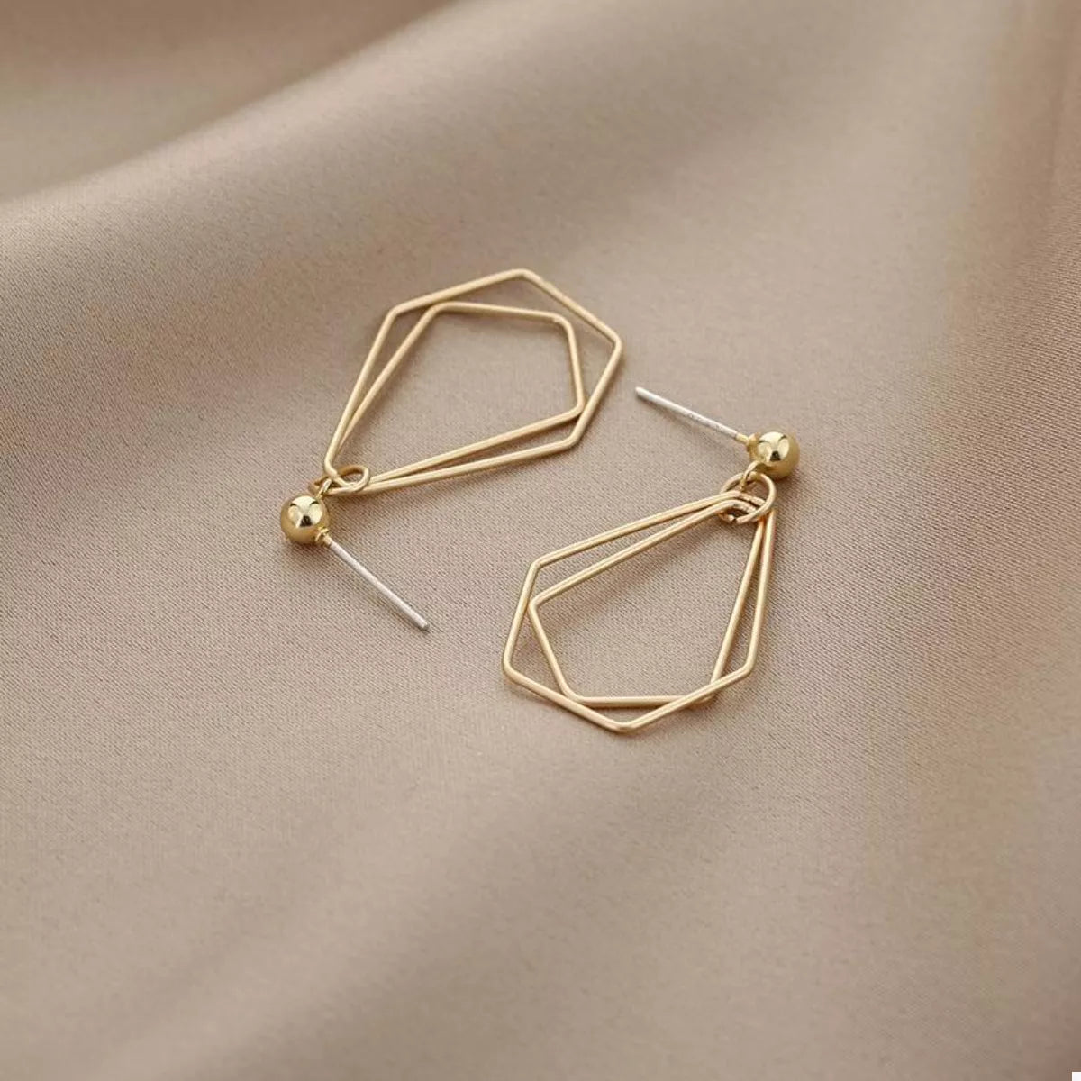 18K gold-plated alloy geometric wire drop earrings with modern minimalist design and sleek, stylish appearance.