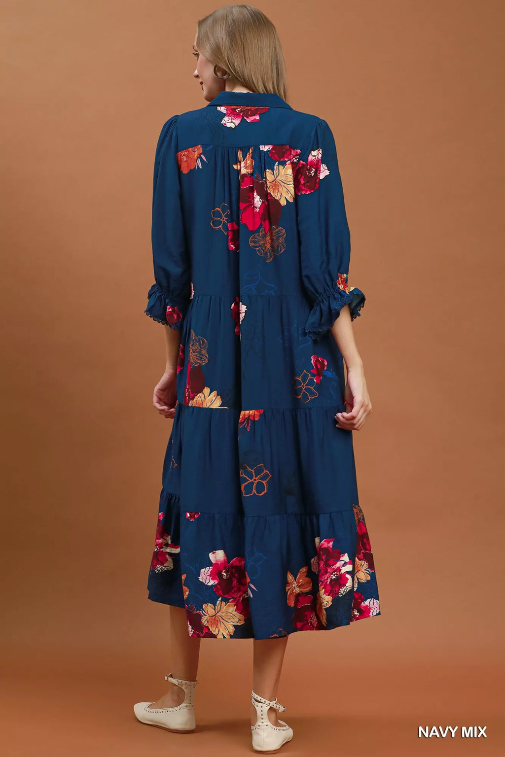 Umgee floral print tiered midi dress with puff sleeves, showcasing a feminine, flowy design perfect for spring and summer wear.
