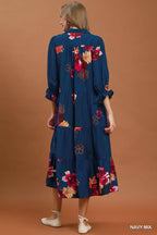Umgee floral print tiered midi dress with puff sleeves, showcasing a feminine, flowy design perfect for spring and summer wear.