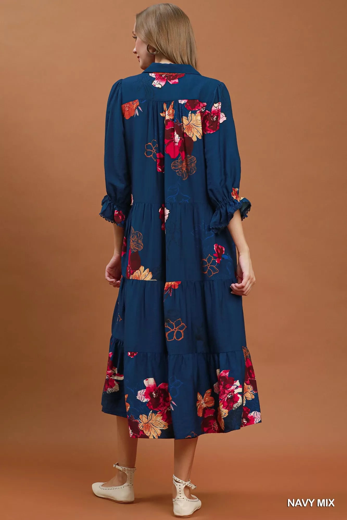 Umgee floral print tiered midi dress with puff sleeves, showcasing a feminine, flowy design perfect for spring and summer wear.