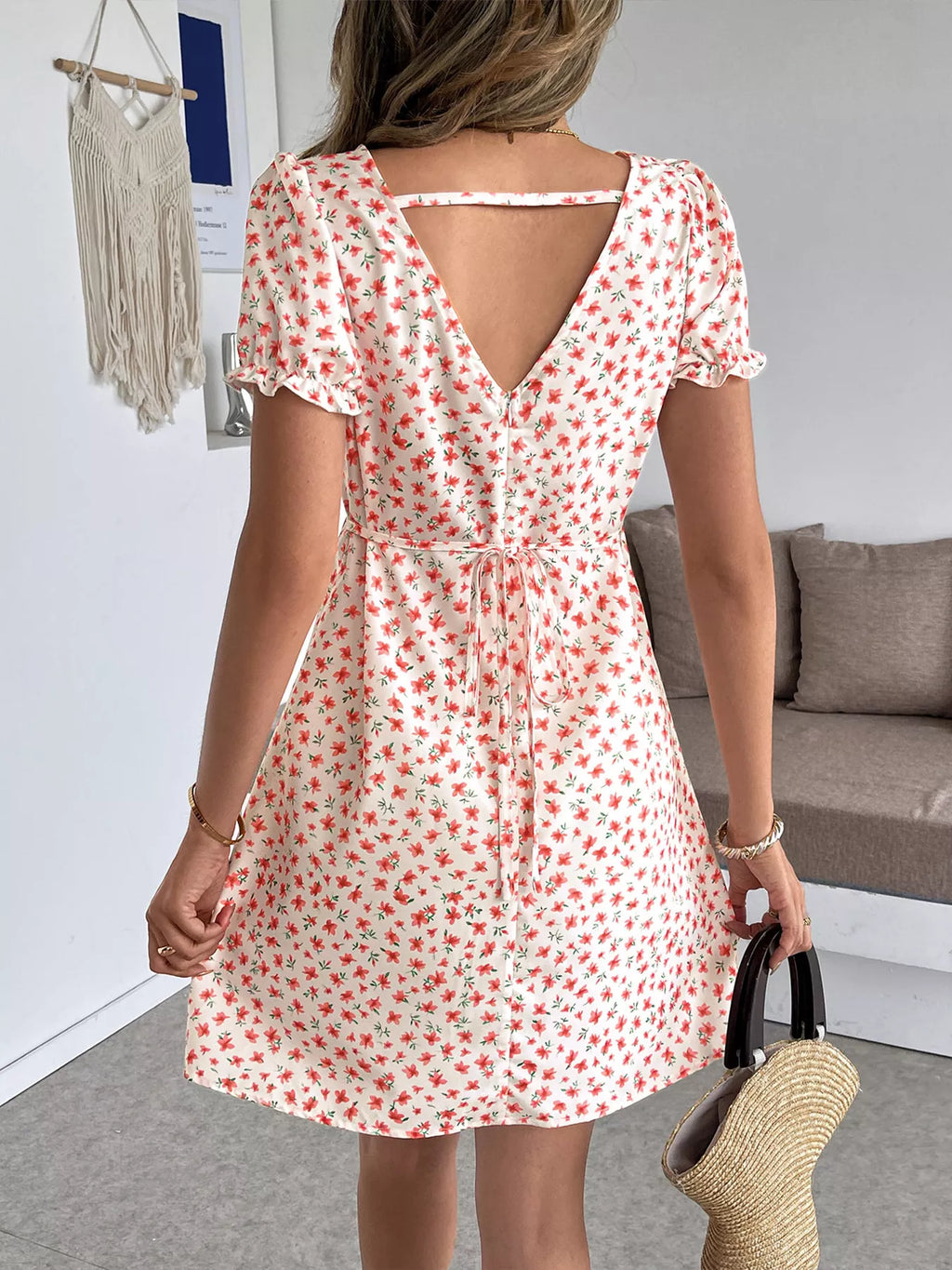 Floral print V-neck puff sleeve mini dress by Trendsi, women's casual summer dress with a flowy silhouette and vibrant floral pattern.