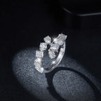 Sterling silver bypass ring with 2.6 carat moissanite gemstone, showcasing a sleek, elegant design.
