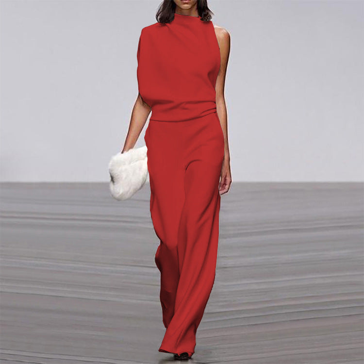 Solid color one-shoulder jumpsuit with pile collar from Plush Fashion Hub, displayed on a hanger.