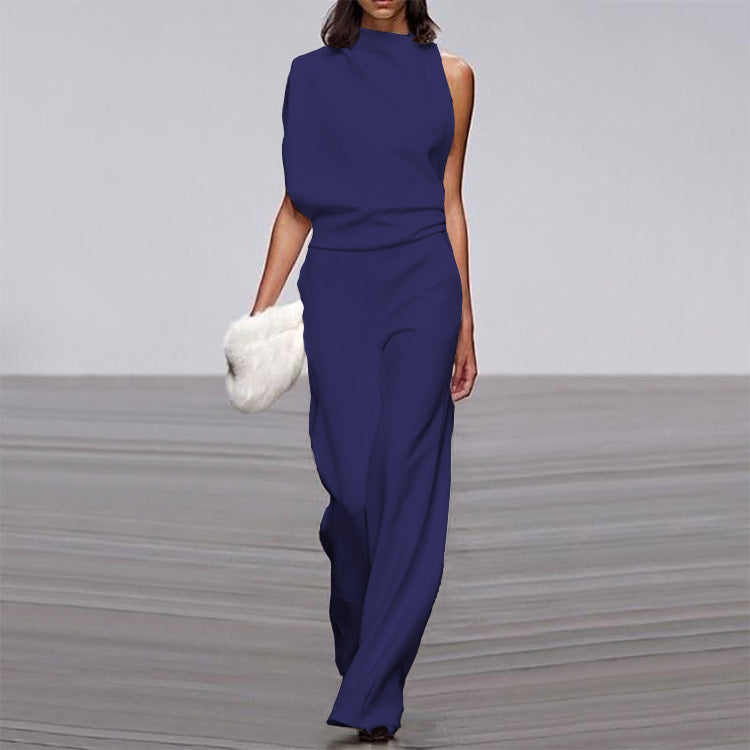 Solid color one-shoulder jumpsuit with pile collar from Plush Fashion Hub, showcasing a stylish, modern design on a model.