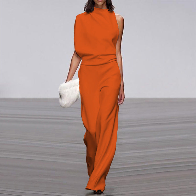 Solid color one-shoulder jumpsuit with pile collar from Plush Fashion Hub, showcasing its stylish design and fit.