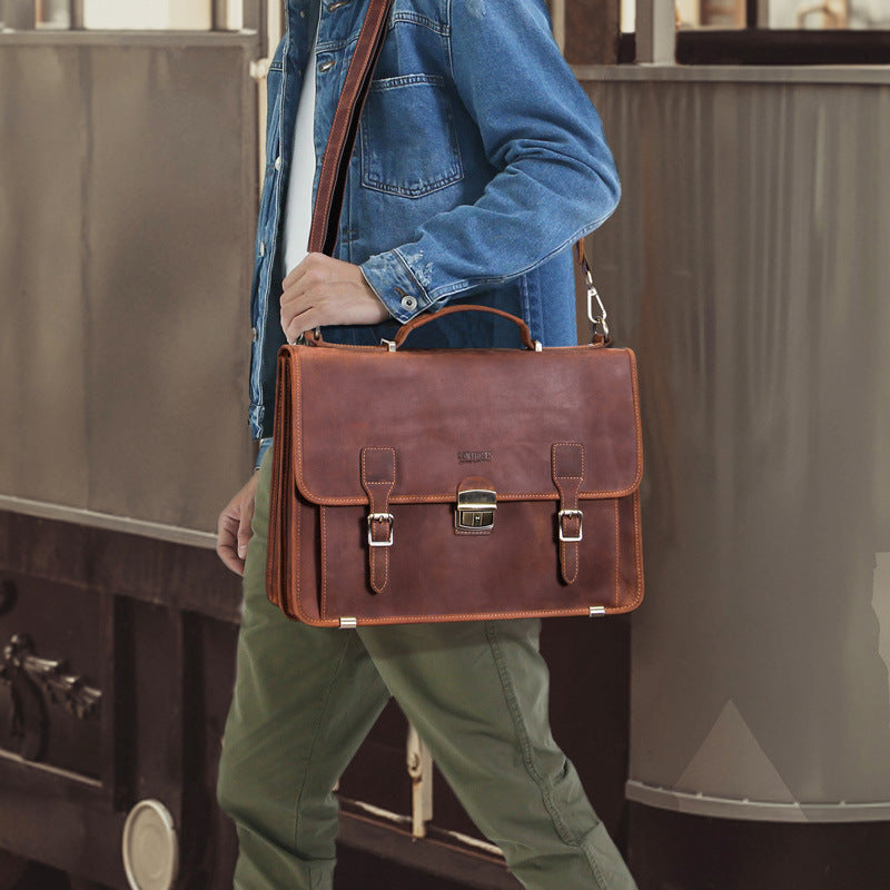 Leather men's 14-inch laptop briefcase from Plush Fashion Hub, featuring a professional business design with multiple compartments.