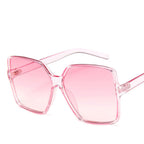 Vintage big frame sunglasses in black with UV400 protection, stylish eyewear from Plush Fashion Hub.