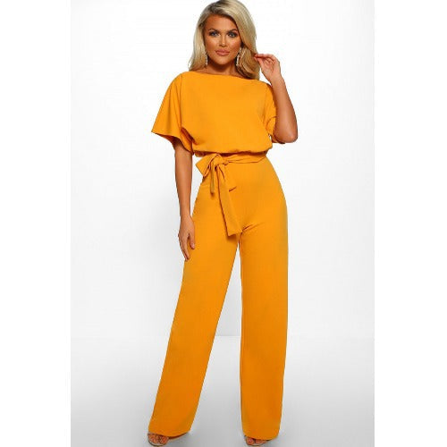 Short-sleeve women's body suit by Plush Fashion Hub, form-fitting jumpsuit with straight-leg design and adjustable straps.