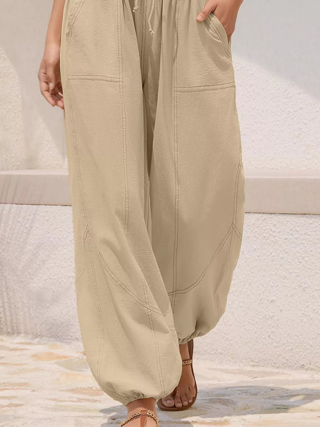 Casual loose-fit harem joggers with drawstring waist from Trendsi, featuring relaxed fit and comfortable fabric.