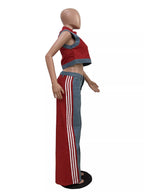 Zip front crop top and striped pants set by Shopimist, featuring a stylish crop top with a zipper and matching striped trousers.