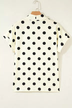 Polka dot print high neck dolman top from Plush Fashion Hub, featuring a relaxed fit and stylish design in a close-up image.