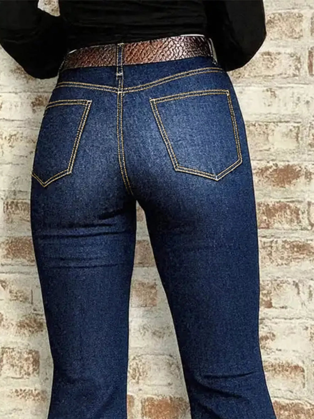 High-waisted flare denim jeans from Plush Fashion Hub, showcasing the stylish fit and classic flare design.