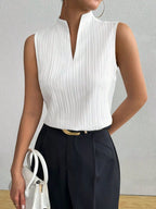 Women's textured notched neck sleeveless tank top by Trendsi, showcasing a versatile basic shell with a stylish design.