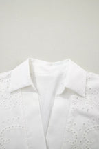 Solid color eyelet embroidered mini dress by Trendsi featuring a casual T-shirt style with eyelet details and embroidery.