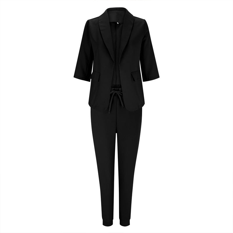Women’s casualwear blazer and drawstring pants suit set by FitiqueFit, featuring a notch-lapel blazer and matching pants.