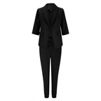 Women’s casualwear blazer and drawstring pants suit set by FitiqueFit, featuring a notch-lapel blazer and matching pants.