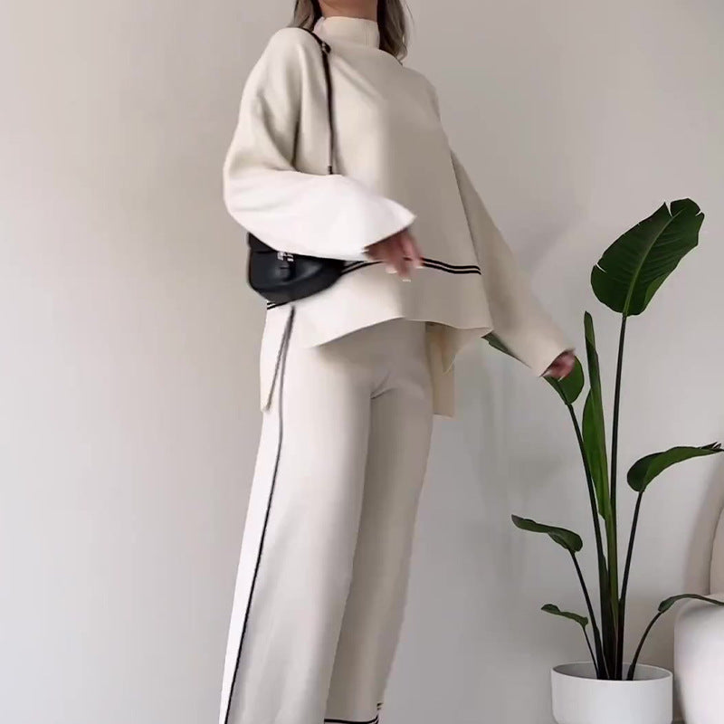 Women’s solid color casual two-piece set from FitiqueFit with a loose top and bootcut pants, perfect for comfortable everyday wear.
