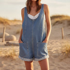 Women’s loose denim overall shorts by FitiqueFit, styled as summer streetwear bib shorts with distressed details and adjustable straps.