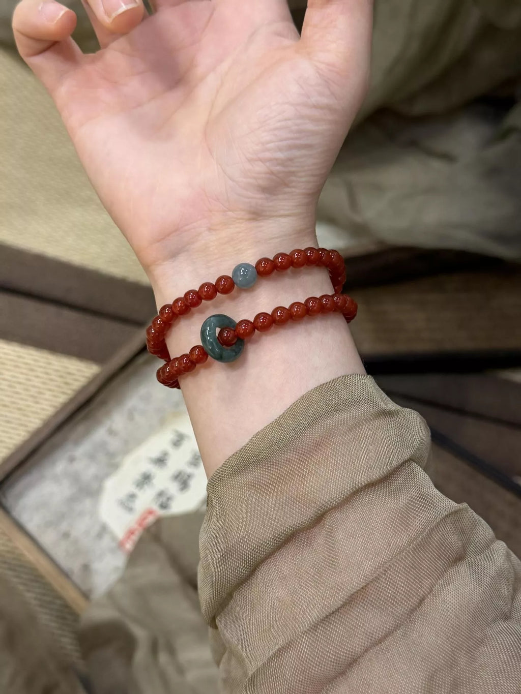 Double layered agate beaded bracelet featuring smooth, polished stones in natural tones, stylish accessory for casual or elegant wear.