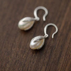 925 sterling silver drop earrings with elegant teardrop design, crafted by Shopimist for a stylish accessory.