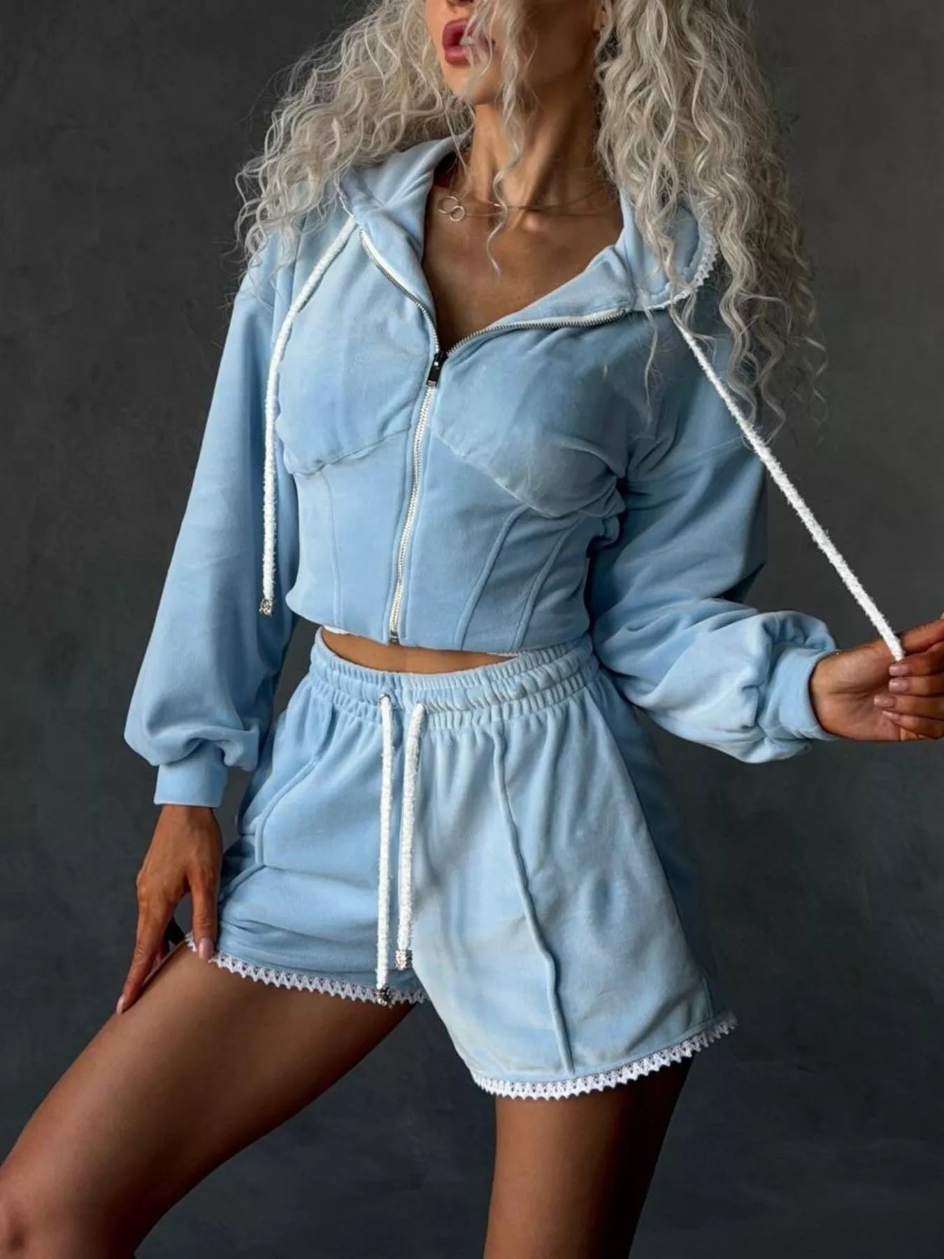 Plush Fashion Hub zip-up hooded shorts set featuring a matching top and shorts in soft, plush fabric, casual and comfortable style.