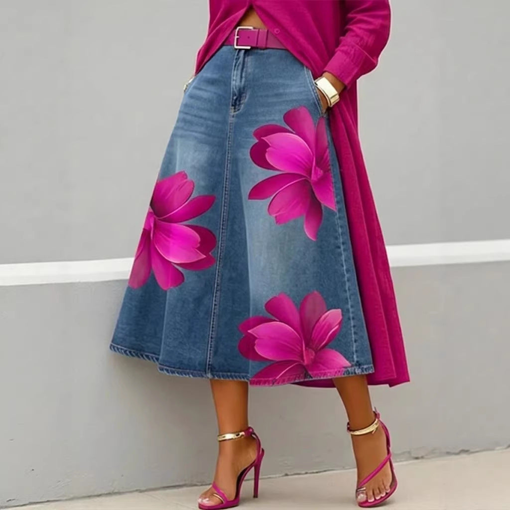 Women's floral print denim-style boho A-line midi skirt by FitiqueFit with a flowing, patterned design and waistline detail.