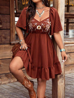 Women's floral embroidered ruffle short-sleeve midi dress by FitiqueFit, featuring colorful floral embroidery and ruffle details.