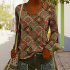 Women's ethnic print V-neck long-sleeve pullover top by FitiqueFit, featuring colorful intricate patterns and a relaxed fit.
